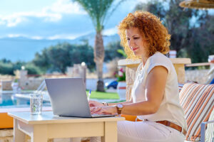 Woman 30s Of Age With A Laptop Working Outdoors